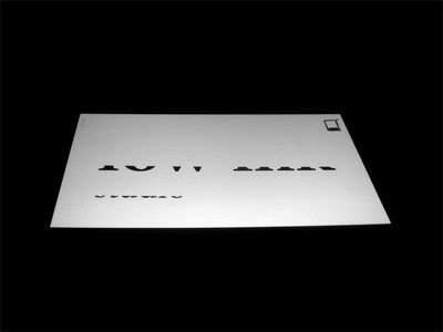 Cool Spot UV Business Card - Low Ink Studio - Tilted