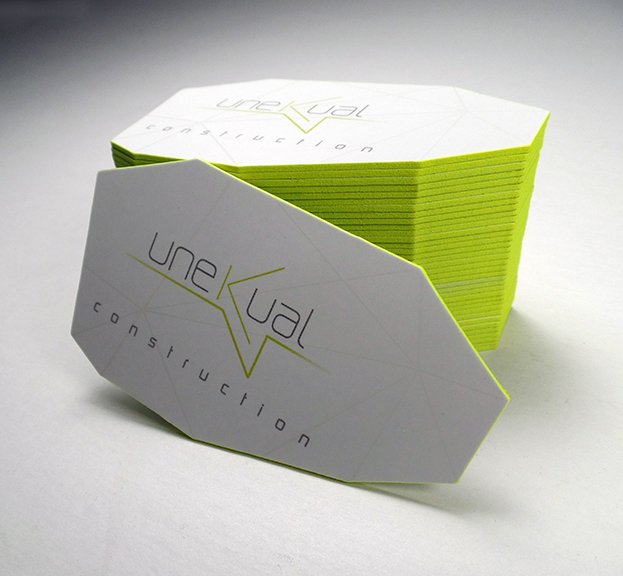 Complete stationary re-design for Miami based high end construction company UNEKUAL Construction.The cards are triple laminated 32Pt paper, spot UV, edge-painting and finally die cut. The card is heavy, and makes an impressive impact on the holder.